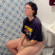 A girl with tattoos and wearing glasses shits while sitting on a toilet in this natural morning scene. Grunting, subtle plops, and pissing is heard. Product reveal during the flush is shown at the end of the clip. Presented in 720P HD. About 5 minutes.